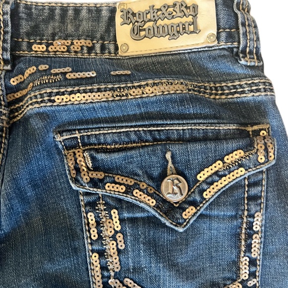 Rock & Roll Cowgirl Denim - Rock & Roll Cowgirl Dark Blue Bootcut Jeans with Gold Sequin Trim